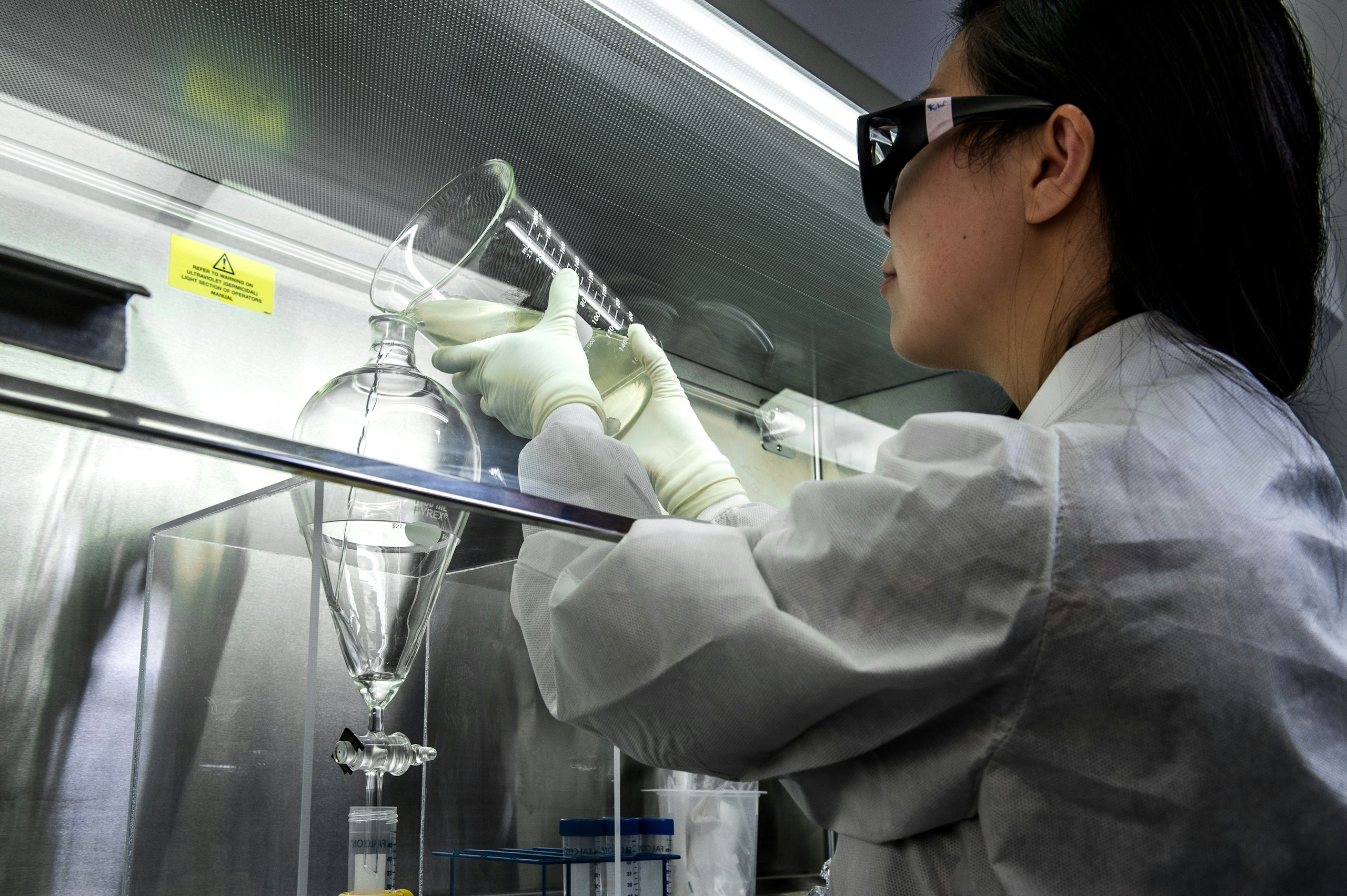 This photograph depicted a Centers for Disease Control and Prevention (CDC) scientist, concentrating poliovirus from sewage, so that the virus could be grown in cultured cells, and then tested using molecular methods. She was performing a polio environmental surveillance technique. There is no routine polio environmental surveillance in the U.S., but surveillance is done in many countries.